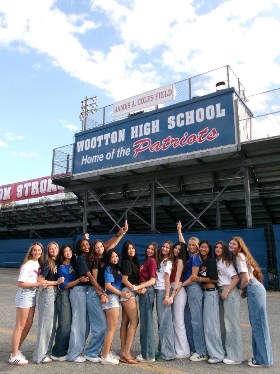 Seniors Peyton Higgins, Jess Yielding, Caroline Min, Helen Manolis, Maya Bellamy, Angie Huang, Kathleen Nie, Jenny Brailovsky, Jilli Nalibotsky, Aava Nik, Emory Scofield, Megan Lomotan, Nicole Khizder and Lilly Kendall celebrate their college commitments at Senior Picnic on "Decision Day," on Friday, May 1. Photo courtesy Jilli Nalibotsky