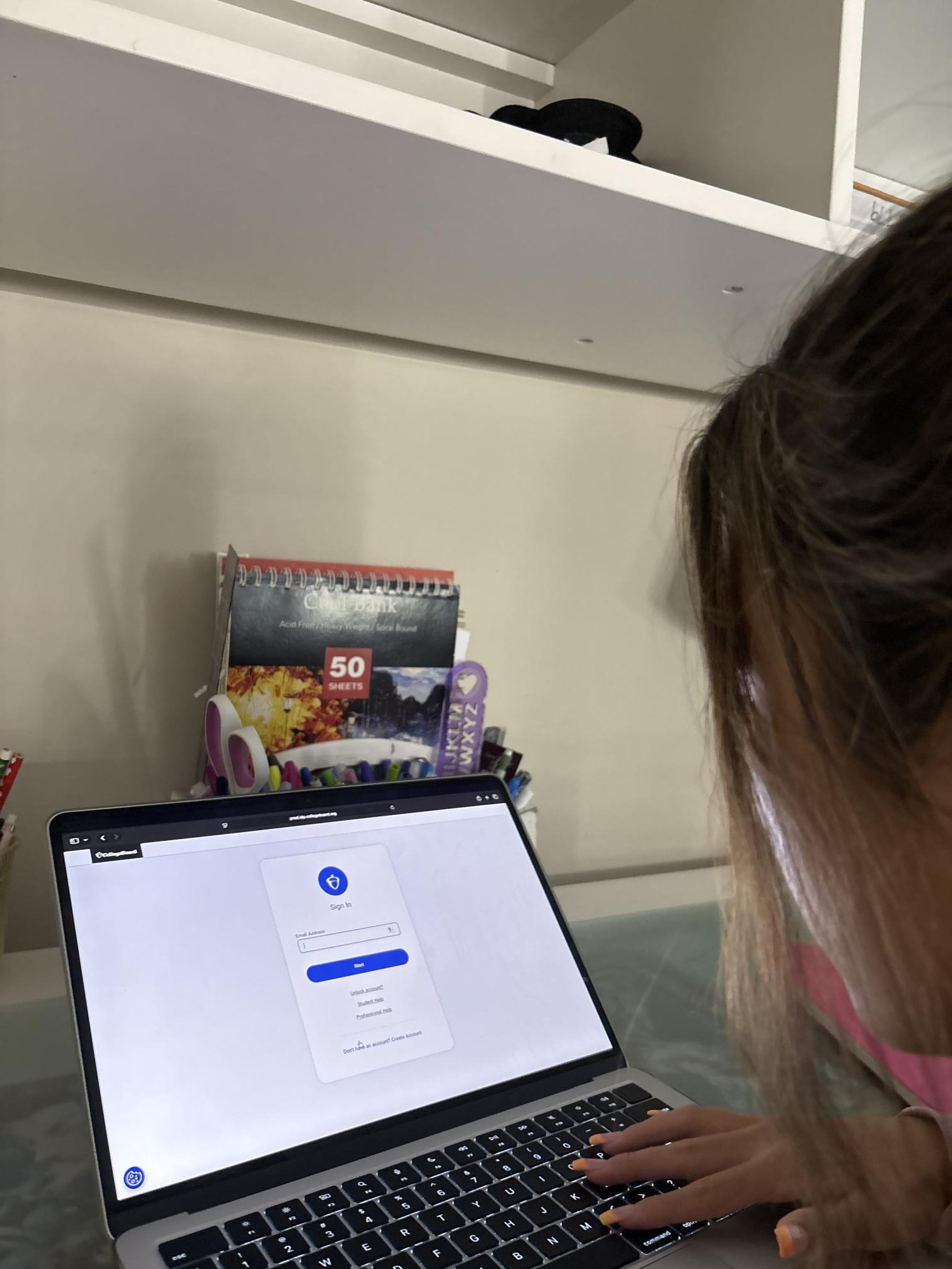 Sophomore Ayana Lee signs into her College Board account to take an AP Government practice test.